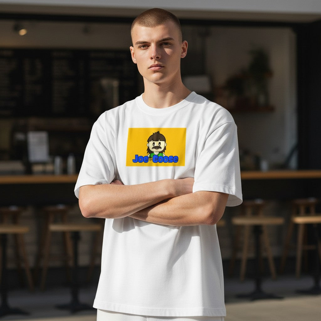 Model wearing a Joe the Goose Apparel white heavy cotton t-shirt with a yellow graphic print featuring a cartoon.